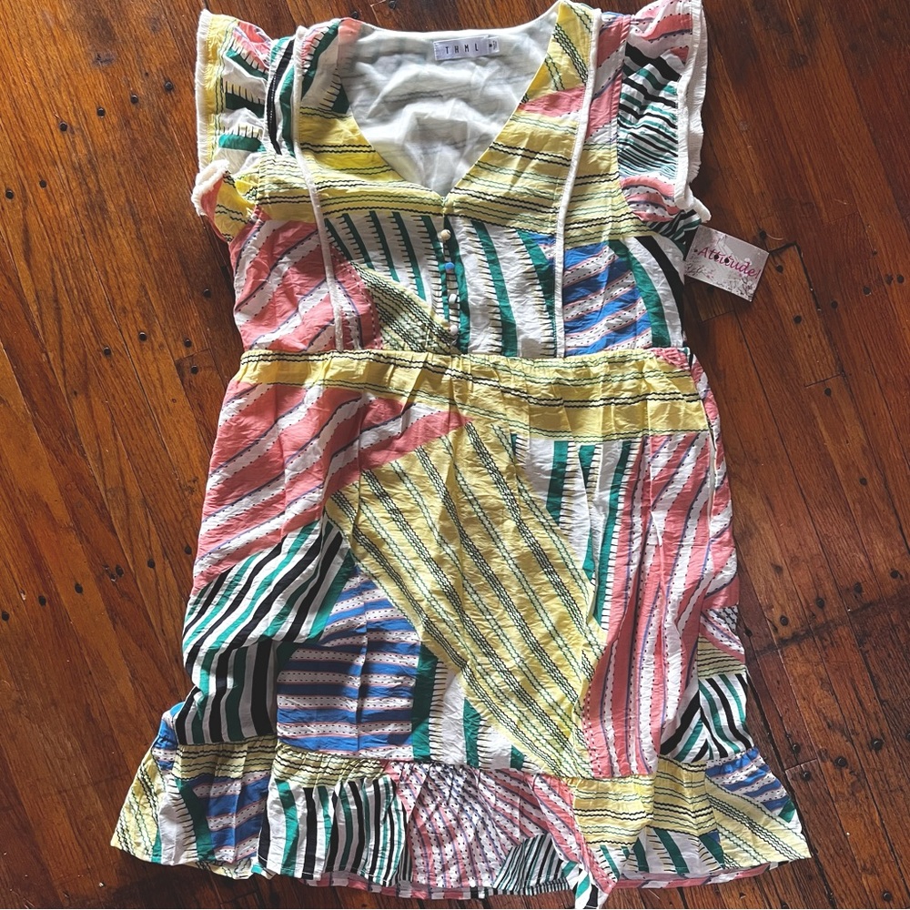 NWT size Med Adorable patchwork style sundress fully lined soft fringe detail
